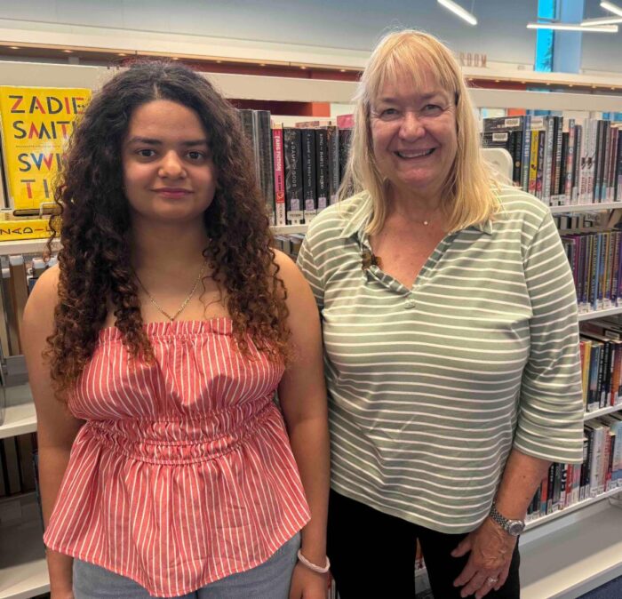 Bella and her tutor, Janice, at the library.