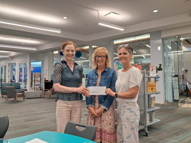 Bess & Jennifer presented Sherwood Forest donations to the Literacy Council at Discoveries Library in July.